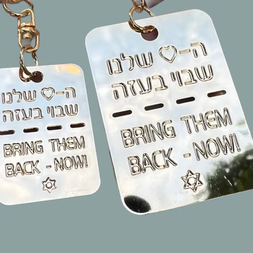 bring them home dog tags gold silver. Disc tags  dog tag to remind the kidnapped citizens  in Gaza. Bring them Back.