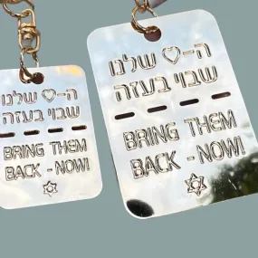 bring them home dog tags gold silver. Disc tags  dog tag to remind the kidnapped citizens  in Gaza. Bring them Back.