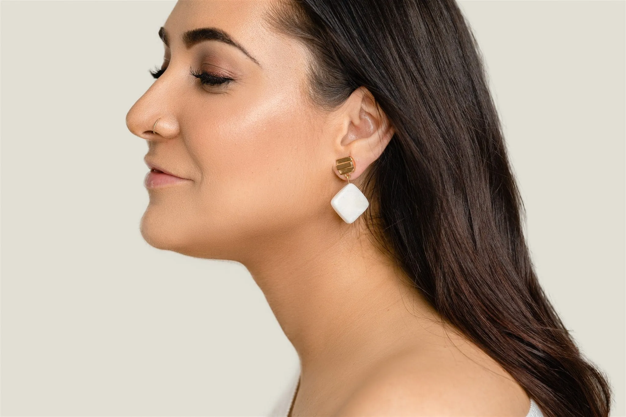 gold layered dome   white jade earrings