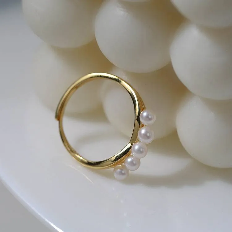 Open closure freshwater pearls Rings