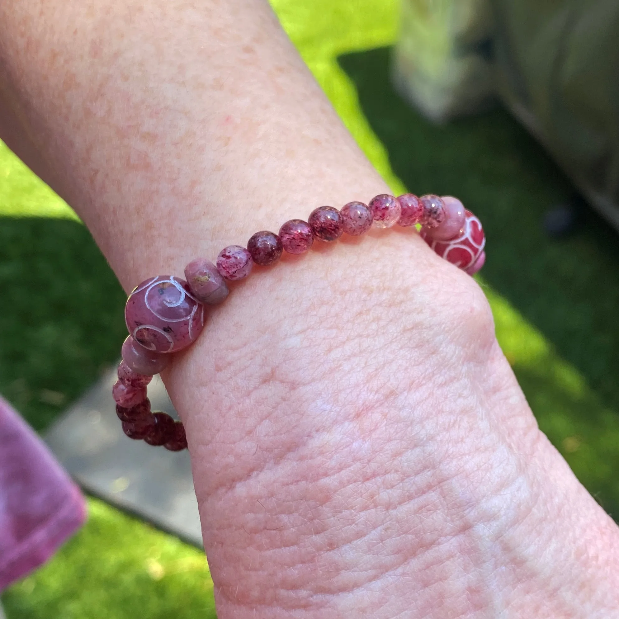 Red Jade, pink tourmaline, and strawberry Lepidocrocite gemstone stretch bracelet