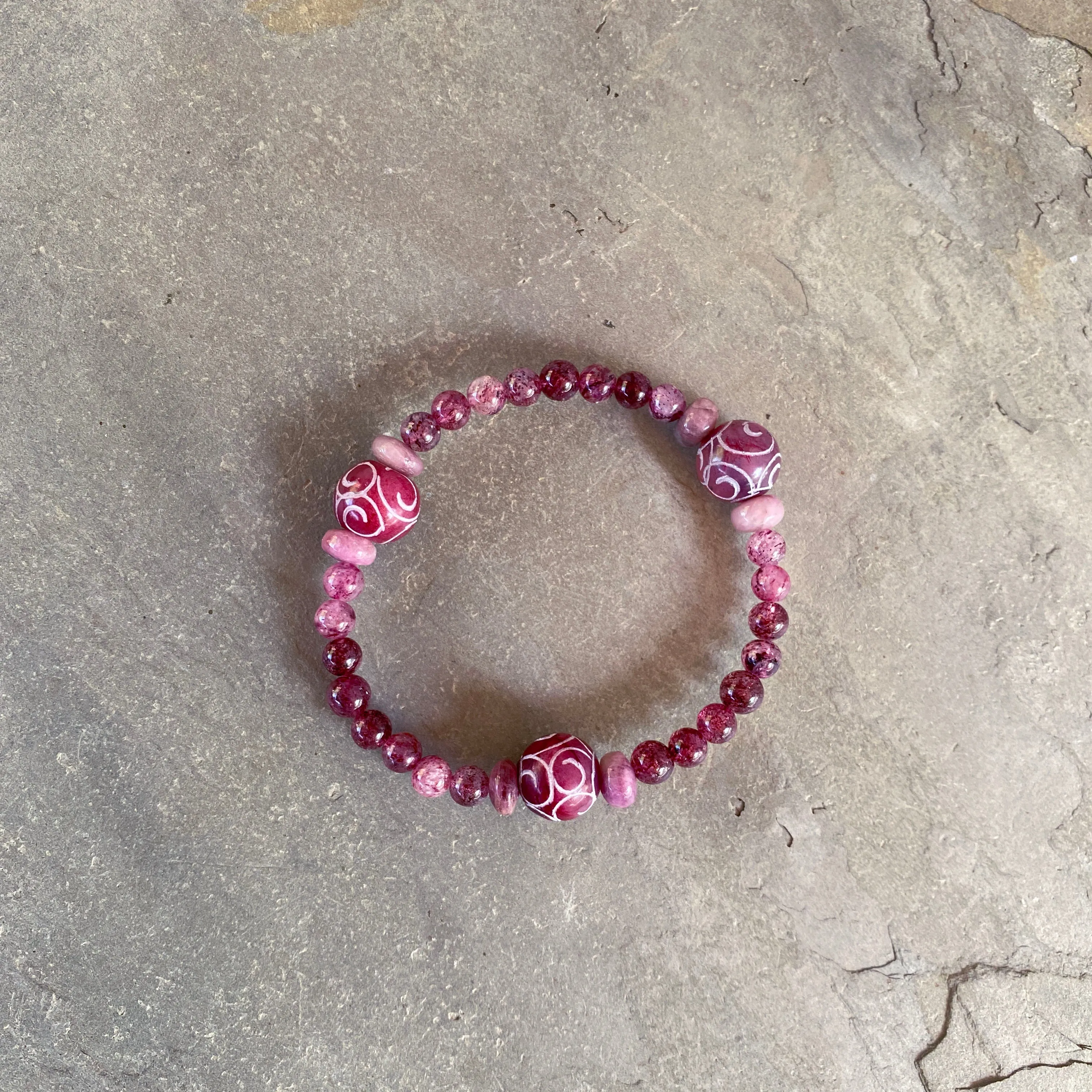 Red Jade, pink tourmaline, and strawberry Lepidocrocite gemstone stretch bracelet