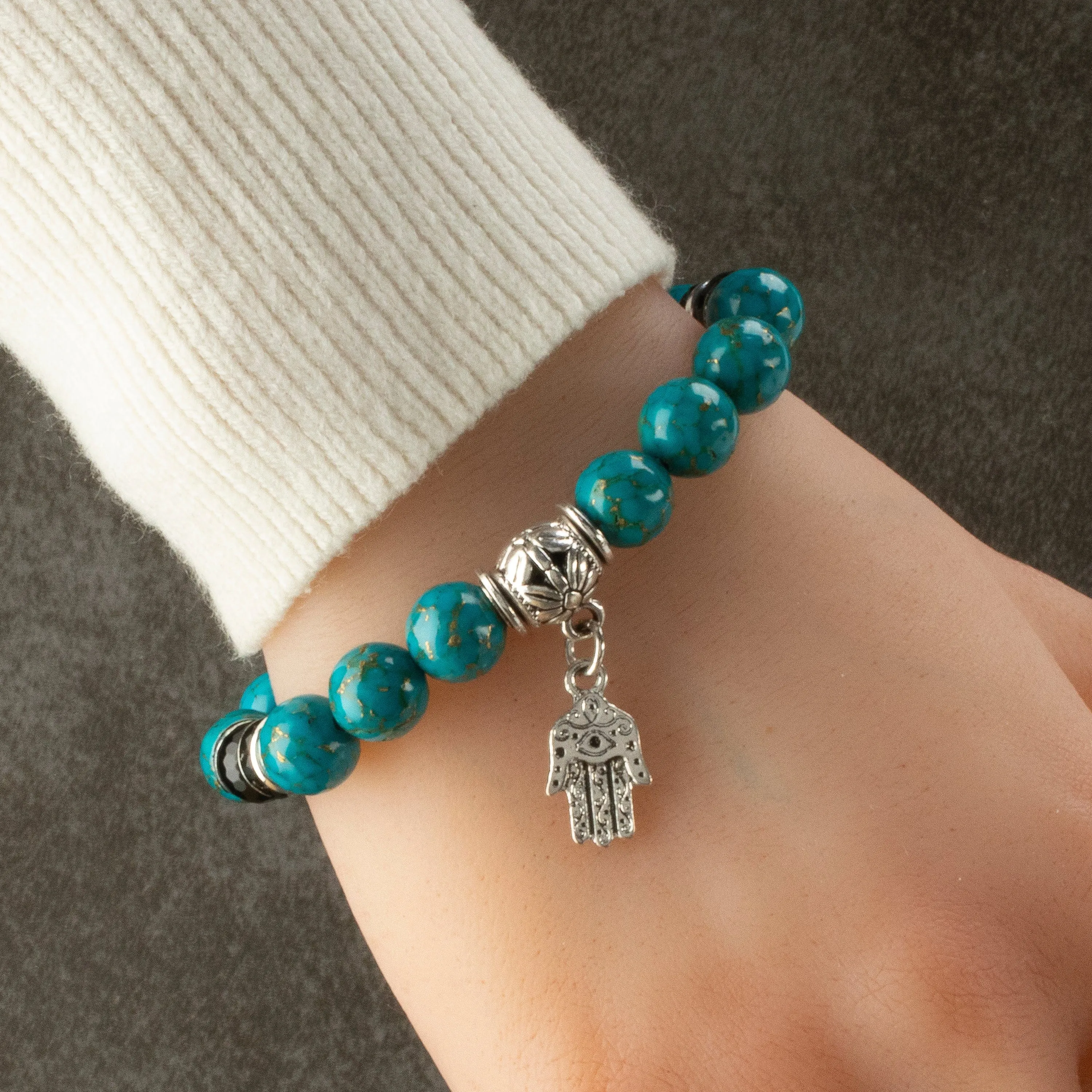 Turquoise 10mm Gemstone Elastic Bead Bracelet with Hamsa Charm & Black Agate Accent Beads