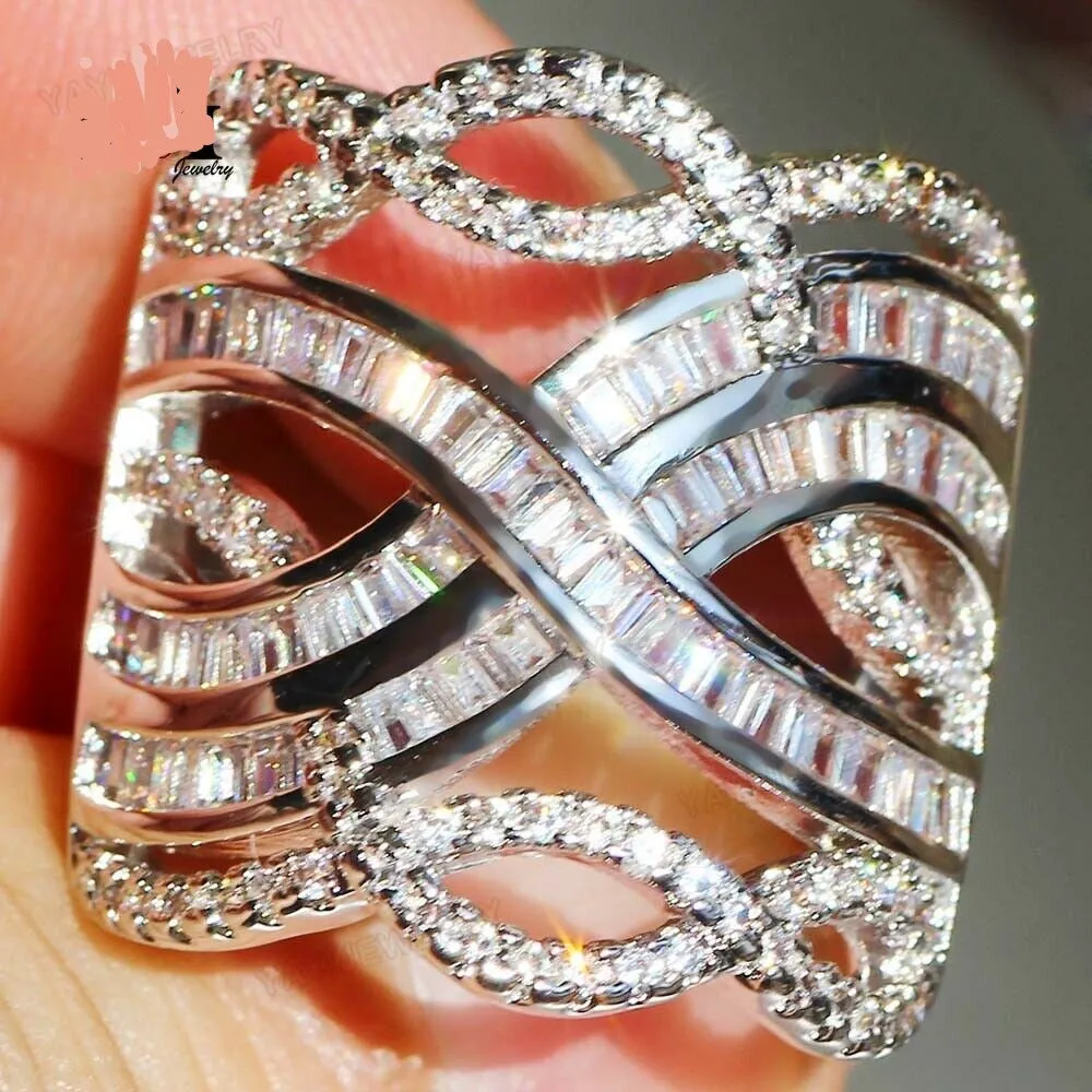 White Sapphire Baguette Crisscross Highway Cocktail Ring